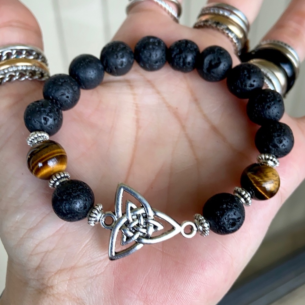 Celtic knot charm 10mm lava & tiger eye bracelet